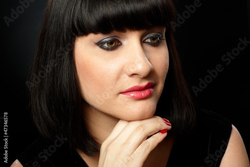 Photo: Portrait of young woman Portrait of young woman
