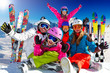 Ski, snow, sun and winter fun - happy family ski team
