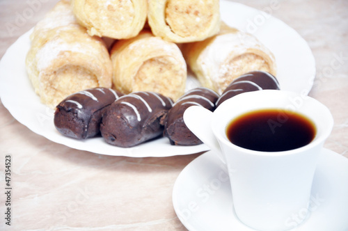 Photo: Puff pastry rolls with cream, chocolate and coffee potatoes Puff pastry rolls with cream, chocolate and coffee potatoes