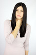 Serious beautiful woman sick with throat problem sore
