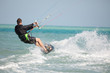 Kiteboarder enjoy surfing