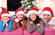 Christmas Family with Kids. Happy Smiling Parents and Children