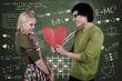 Photo: Cute nerd guy and girl holding heart in classroom Cute nerd guy and girl holding heart in classroom