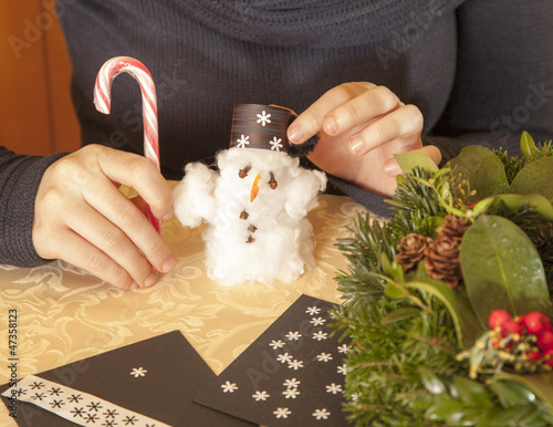 Photo: Making cotton-wool snowman-selective focus on snowman Making cotton-wool snowman-selective focus on snowman