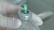 nurse prepares a drug for injection