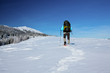 Hiker in winter mountains