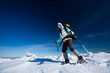 Hiker in winter mountains