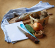 Opened notebook and ingredients for lean fish dinner