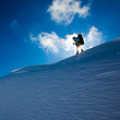 Hiker in winter mountains