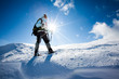 Hiker in winter mountains