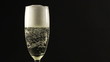 pouring champagne with strawberry