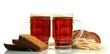 tankards of kvass and rye breads with ears, isolated on white