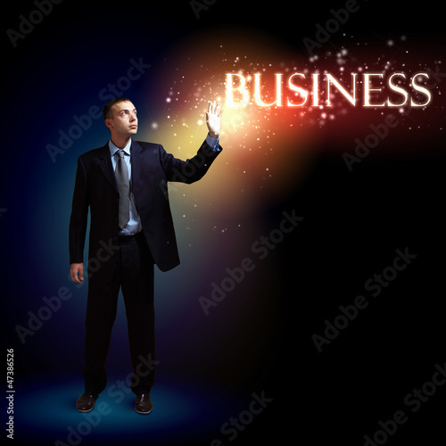 Photo: Businessman with light shining Businessman with light shining