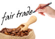 coffee beans with hand writes fair trade