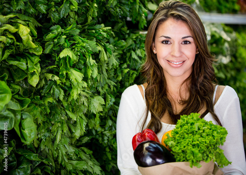 Photo: Woman buying fresh vegetables Woman buying fresh vegetables