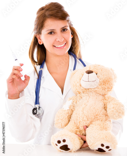Photo: Pediatrician with a vaccine Pediatrician with a vaccine