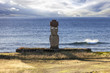 Moai with white eyes with sea in background