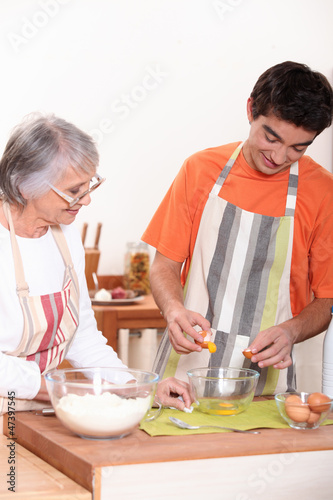 Photo: Mother and some baking in kitchen Mother and some baking in kitchen