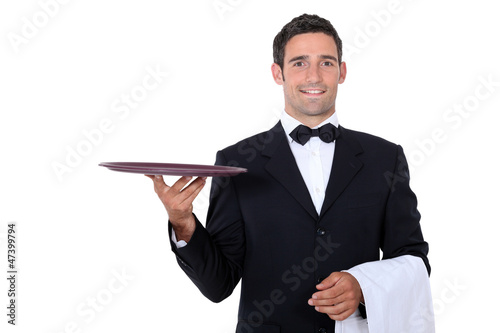 Photo: Waiter with tray smoking and balance Waiter with tray smoking and balance