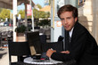 Young executive in a cafe