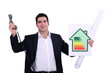 commercial agent holding an energy label and a phone