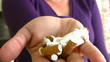 Woman breaking a cigarette
