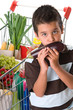 Photo: Little child smelling eggplant Little child smelling eggplant