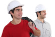 Tradesmen looking sideways