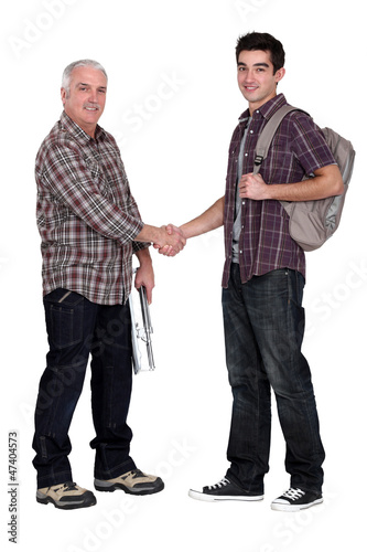 Photo: A tiler and his apprentice. A tiler and his apprentice.