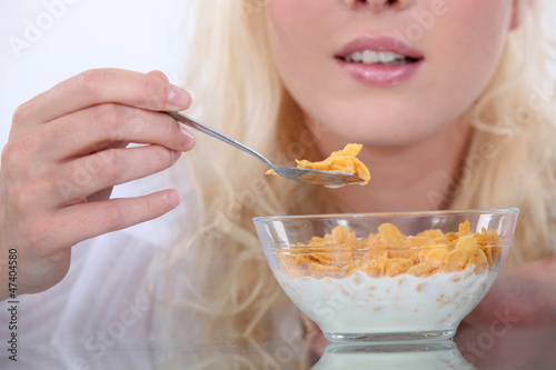 Photo: Woman eating cereal Woman eating cereal