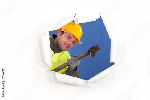 Photo: Builder with a pickaxe Builder with a pickaxe