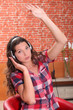 Young girl listening to music