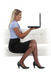 Blond businesswoman chatting via the Internet