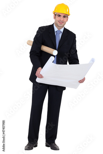 Photo: Architect looking at blueprints Architect looking at blueprints