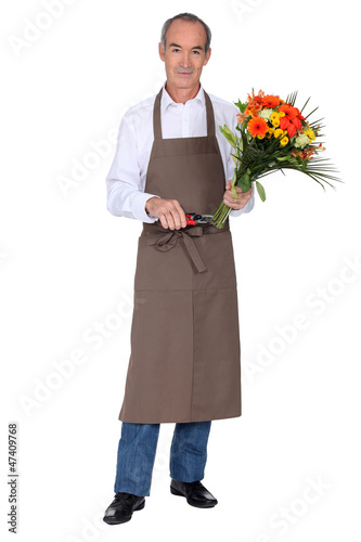 Photo: Male florist with a bunch of flowers Male florist with a bunch of flowers