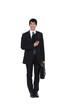portrait of beaming businessman with briefcase