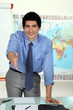 A teacher greeting parents.