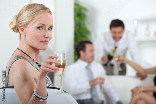 Photo: portrait of a woman with glass of wine portrait of a woman with glass of wine