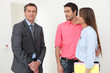 Couple meeting with a real estate realtor