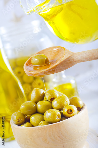 Photo: green olives and oil green olives and oil