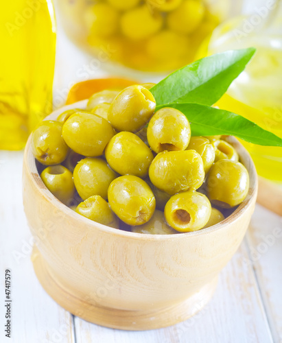 Photo: green olives and oil green olives and oil