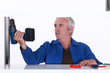 Man holding a power tool