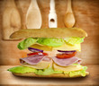 Sandwich on old vintage wooden boards abstract concept