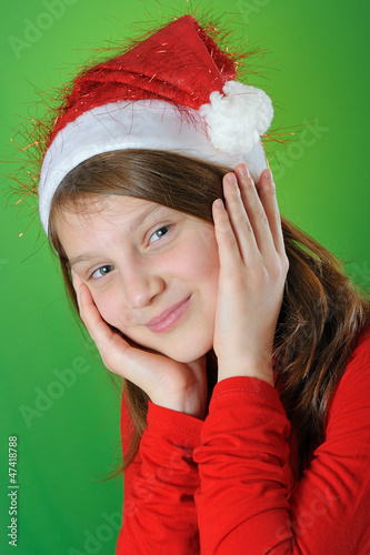 Photo: girl with Santa Claus Hat girl with Santa Claus Hat