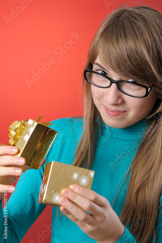 Photo: happy girl with a gift happy girl with a gift