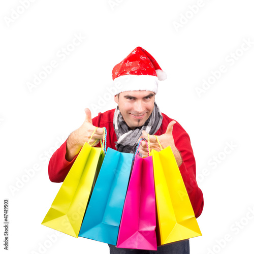 Photo: Santa with coloured Bags, isolated Santa with coloured Bags, isolated