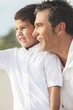 Father and Son Boy Child Having Fun At Beach