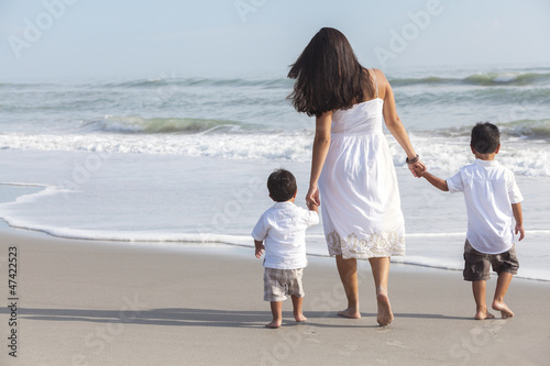 Photo: Hispanic Mother & Two Boy Children Family on Beach Hispanic Mother & Two Boy Children Family on Beach