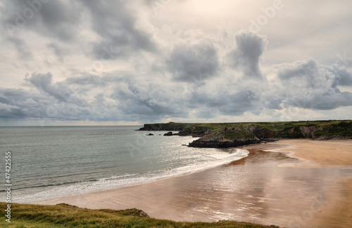 Photo: Broad Haven, Pembrokeshire, under a stormy sky. Broad Haven, Pembrokeshire, under a stormy sky.
