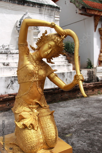 Photo: Goddess of the earth squeezing water from her hair Goddess of the earth squeezing water from her hair